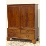 George III mahogany linen press, two figured doors enclosing four oak linen slides,