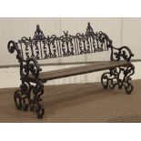 19th century heavy cast iron garden bench, scrolling foliage end rails,