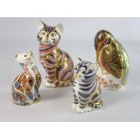 Royal Crown Derby Paperweight in the form of a seated cat and two others all with gold stoppers and