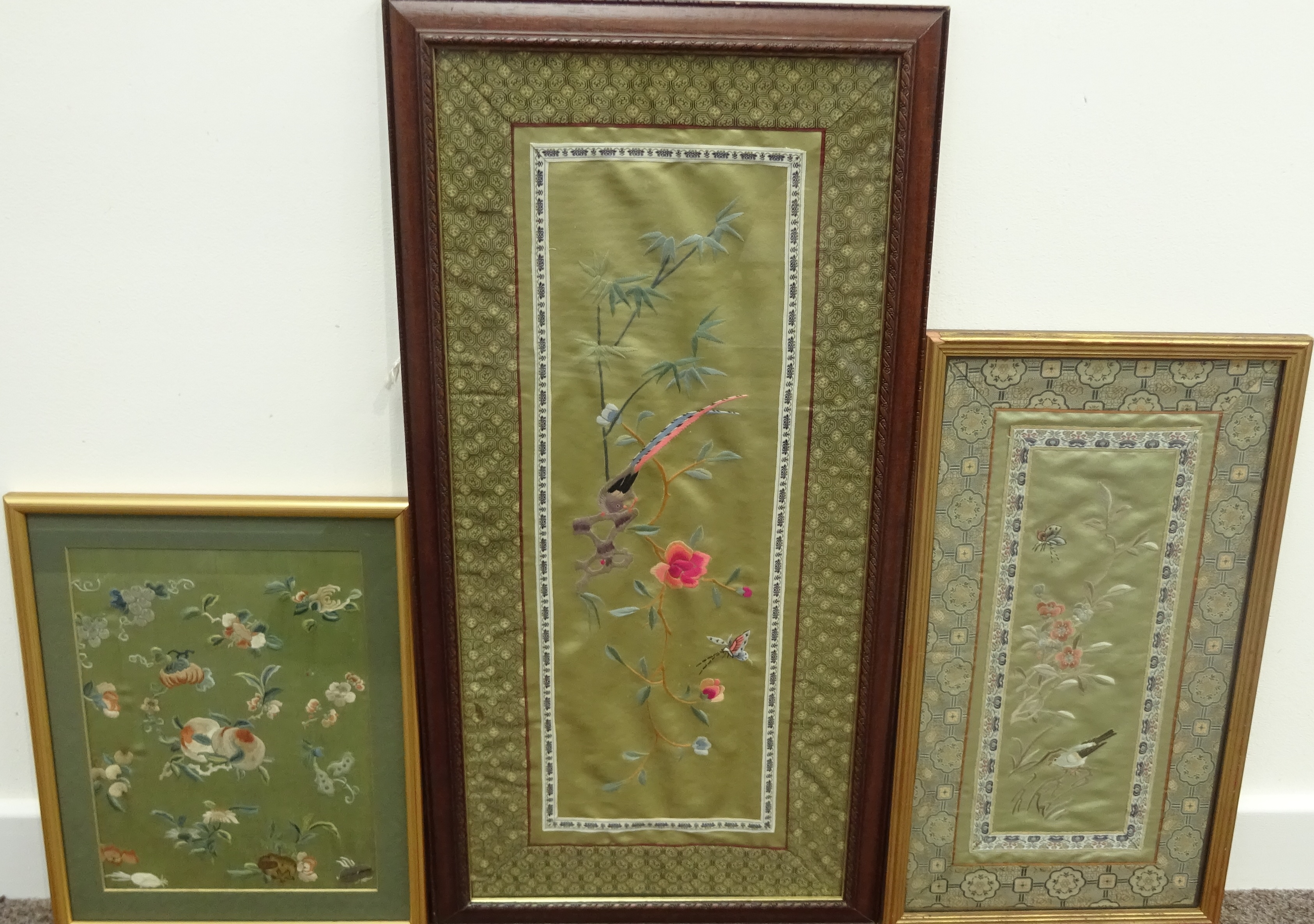 Chinese Silk Panel embroidered with flowers and insects 53cm x 20cm and two other smaller silk