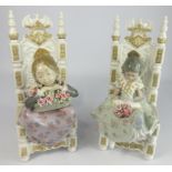 Another pair of Lladro Figures of girls holding flowers seated in throne like chairs 27cm high