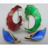 Pair of Norwegian silver gilt and blue enamel leaf shape ear clips and a pair of silver brooches