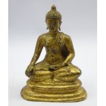 Gilt bronze model of a seated Thai Buddha,