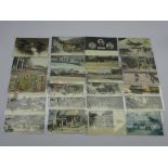 Collection of twenty seven early 20th century Japanese postcards depicting figures,