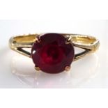 Gold Dress Ring with a single facet cut ruby stamped 9ct Condition Report & Further