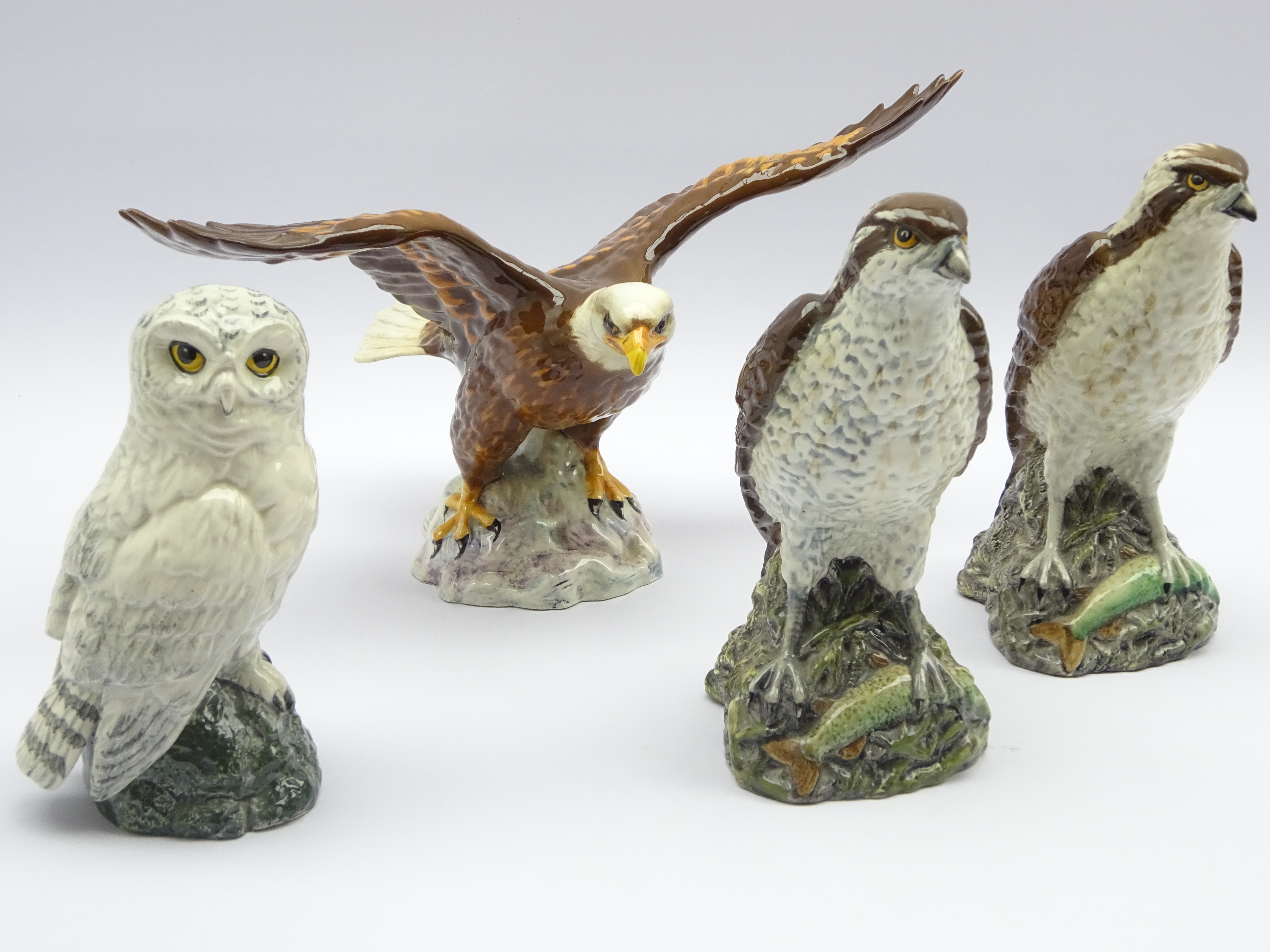 Four Beswick decanters; Bald Eagle two Ospreys,