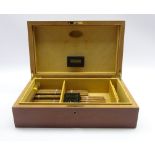 Dunhill mahogany humidor containing thirty Montecristo cigars and a Cohiba cigar,