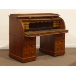 Early 20th century oak cylinder roll top desk, birds eye maple interior fitted with drawers,