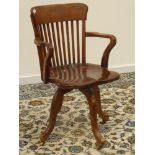 Early 20th century stained beech swivel office desk chair Condition Report & Further