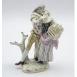 19th century Meissen figure of a couple embracing, the woman carrying a bird cage, incised 169, H17.
