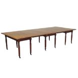 Georgian mahogany thee sectional extending dining table with two additional leaves,