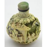 Ivory scent bottle relief carved with children and with traces of polychrome decoration and jade