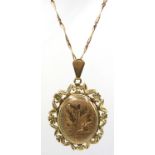 Gold locket pendant necklace hallmarked and stamped 9c approx 10.