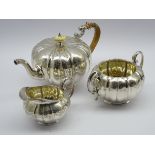Victorian Elkington plate three piece tea set with engraved decoration,