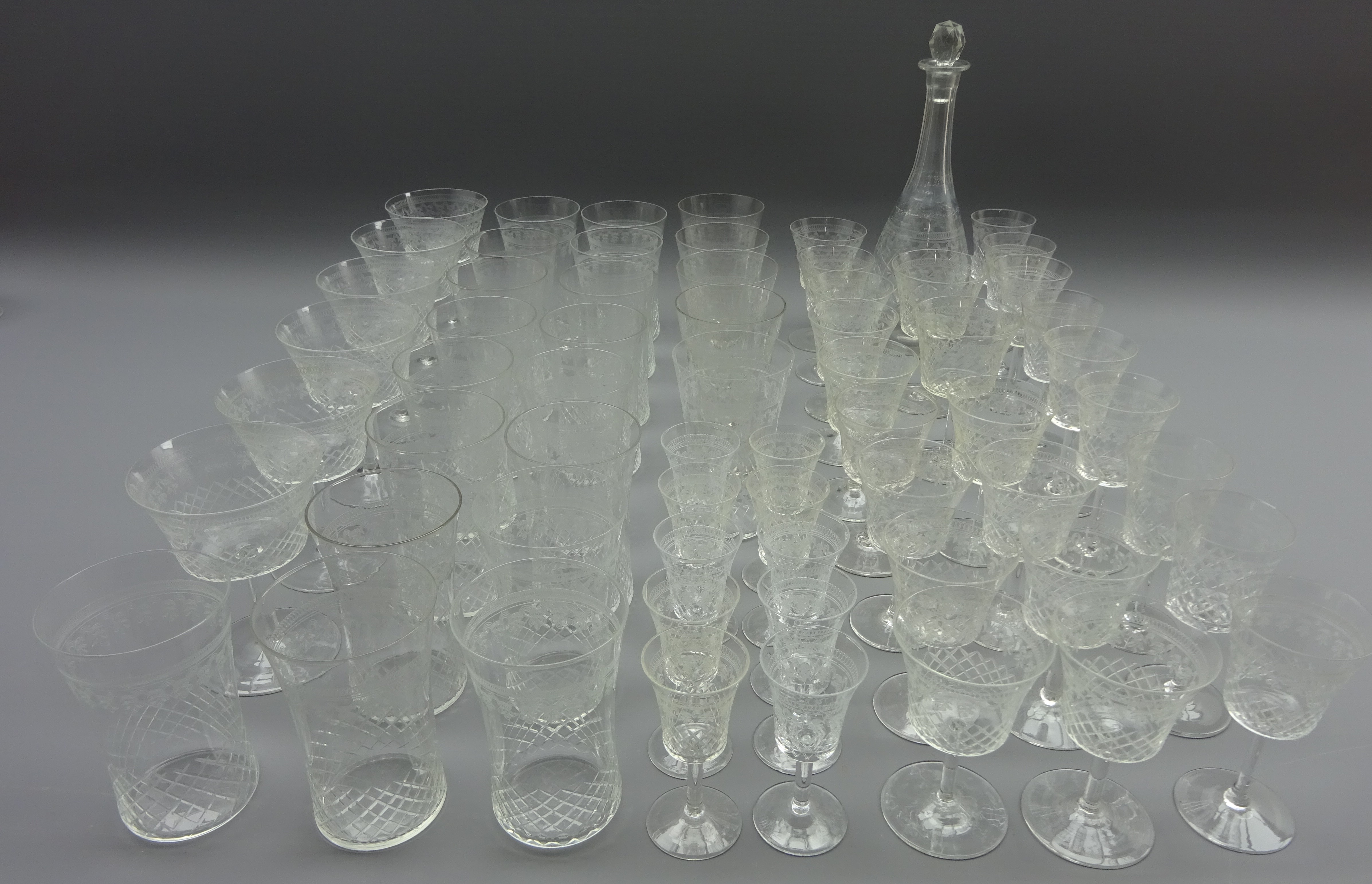 Suite of Edwardian etched drinking glasses including tumblers, wine glasses, sherry, liqueur,