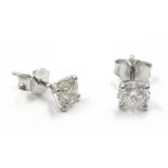 Pair 18ct gold diamond stud ear-rings stamped 750 approx 1 carat Condition Report &
