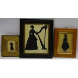 Two early Victorian cut and gilded silhouettes of girls 19cm x 12.