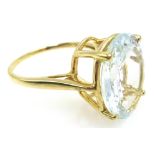 9ct gold ring set with a pale aquamarine,