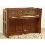 20th century oak upright piano by 'Eavestaff', iron framed and overstrung in a Gothic design,