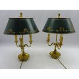 Pair of Victorian style cast brass three branch table lights with green and gold painted metal