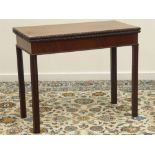 19th century mahogany card table, rectangular fold over top, ribbon and flower head carved,