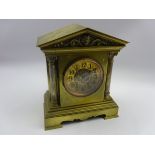 Early 20th century mantle clock with black numerals and gong strike in brass architectural style