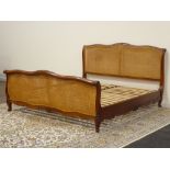 Frank Hudson - French style walnut 6' Superking size bedstead,