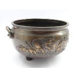 Japanese bronze two handled jardiniere decorated with raised pattern of dragons,