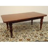 Late Victorian walnut dining table, moulded rectangular top with canted corners,