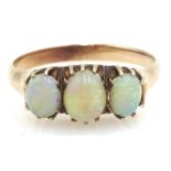 Rose gold three stone opal ring tested 14ct Condition Report & Further Details
