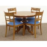 Circular walnut top dining table on turned pedestal with three splayed supports (D106cm, H75cm),