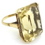 9ct gold ring set with a large facetted citrine hallmarked Condition Report & Further