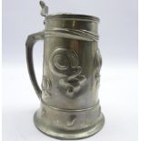 Art Nouveau Liberty Tudric pewter lidded tankard with stylised tadpole and kidney design,