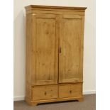 Late 19th century waxed pine double wardrobe, two panelled doors, two drawers, W120cm, H208cm,