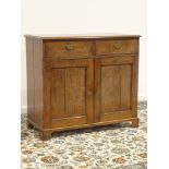 18th century oak dresser base, rectangular moulded top above two drawers and panelled cupboards,