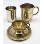 Silver mug with loop handle and later added spout H 9cm,