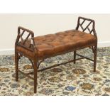 Reproduction stained beech simulated bamboo stool with deeply buttoned upholstered leather seat,
