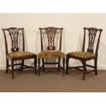Three George III mahogany dining chairs, pierced back splats,