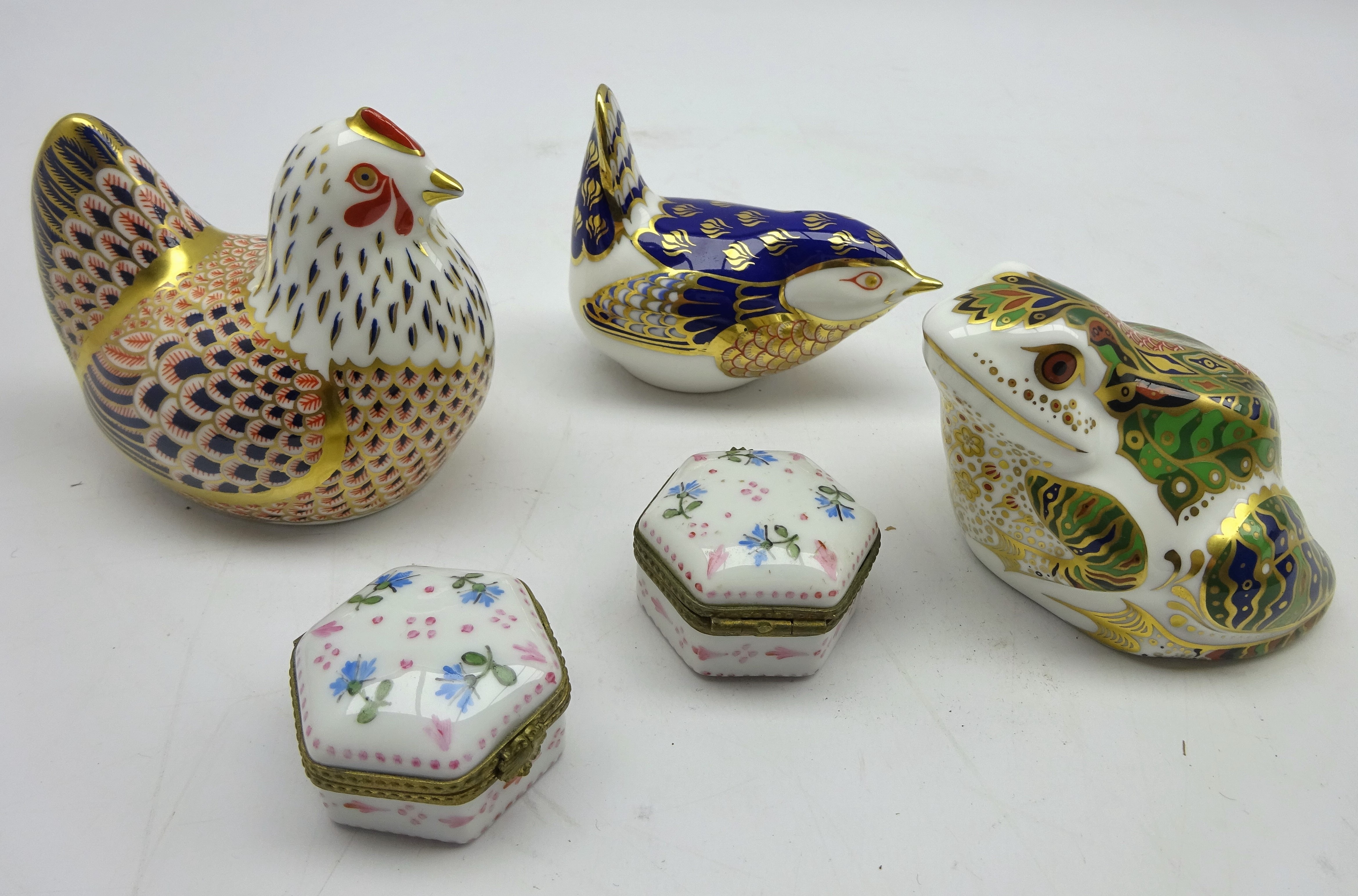 Three Royal Crown Derby paperweights; limited edition frog retailed by Mulberry Hall,