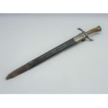German hunting sword inscribed 'Kohl, Stuttgart' the blade etched with game etc,