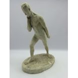 Plaster cast figure of a semi-nude man on oval plinth, signed 'R.W.