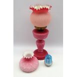 Opaque pink glass table oil lamp H 49cm and an S Clarke fairy pyramid glass night light with fluted