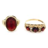 Two 9ct gold garnet rings hallmarked Condition Report & Further Details Approx 5.