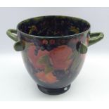 William Moorcroft two handled jardiniere decorated in the fruit and berries pattern with applied