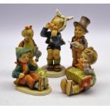 Five Goebel Hummel figures 'Boy with Toothache', 'The Street Singer', 'Lets Sing',