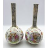 Pair of Plaue flask shape vases decorated with panels of figures and flowers with a gilded neck H