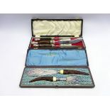 Cased pair of Victorian fish servers with carved softwood handle and a three piece carving set with