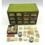 Small cabinet and contents of jewellery parts and accessories including some silver