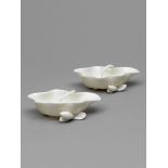 A pair of blanc de chine Dehua lotus-leadf-form brushwashers, late Ming-early Qing Dynasty