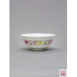 A ‘famille-rose’ relief-moulded bowl Jiaqing six-character iron red seal mark and of the period